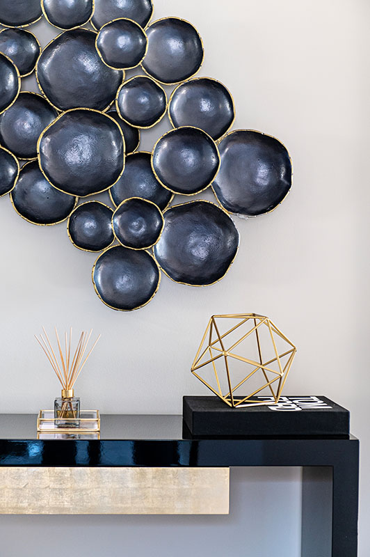 hallway detail wall art and side counter