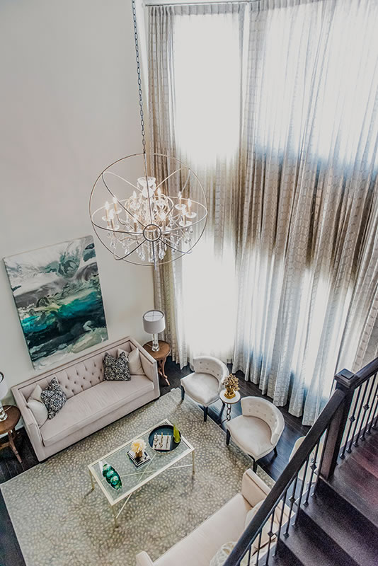 view from upstairs landing looking down into living room