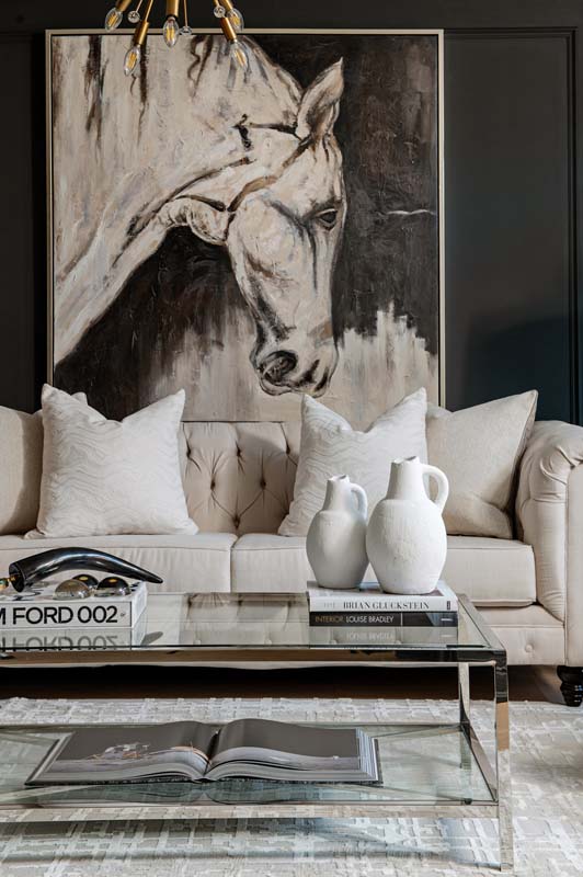 sitting area with horse poster