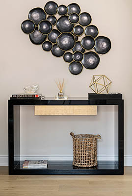 hallway table and wall art